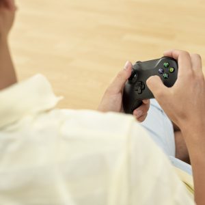 close-up-boy-holding-game-controller